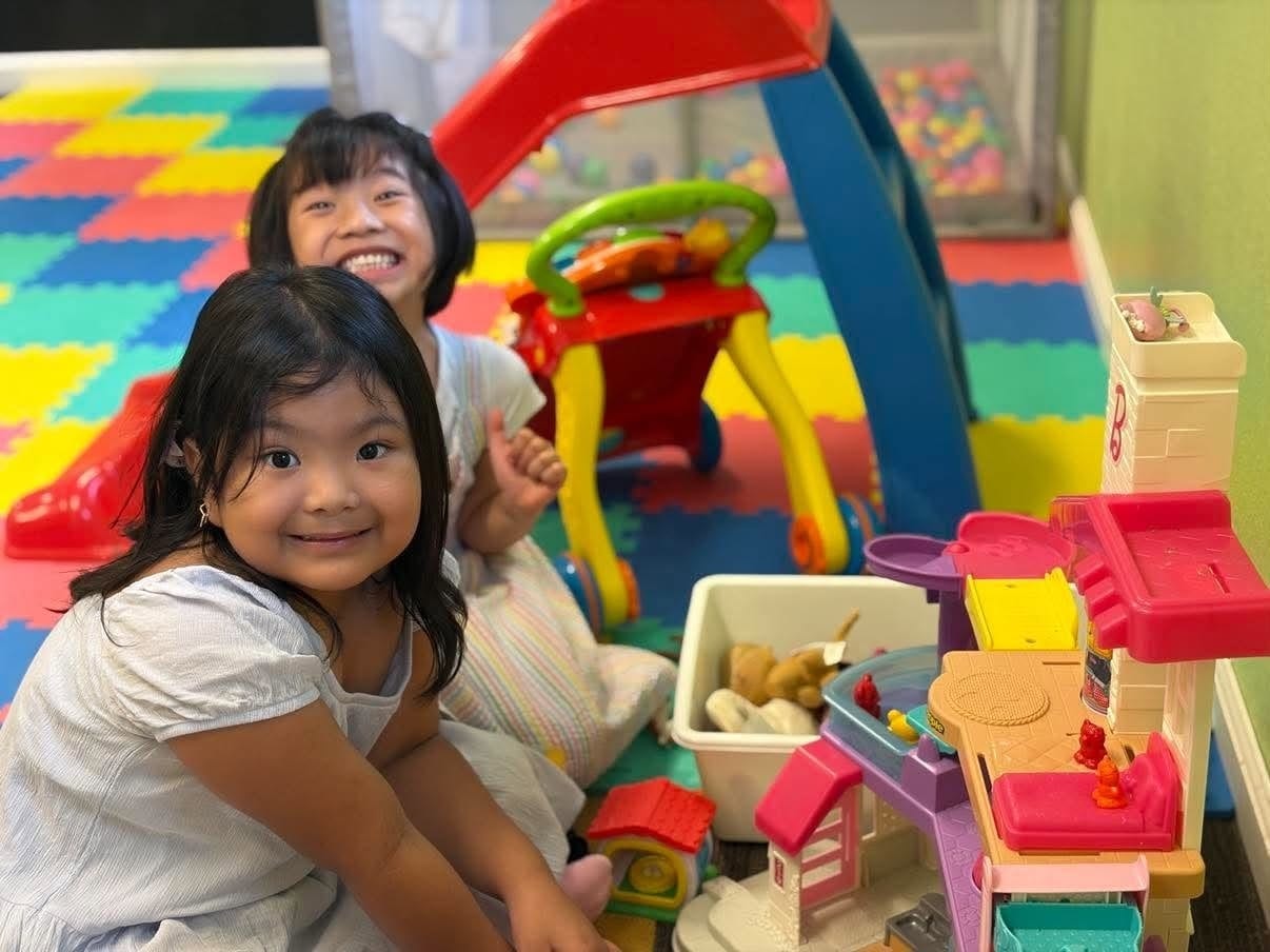 Children learning Bible stories in a colorful classroom