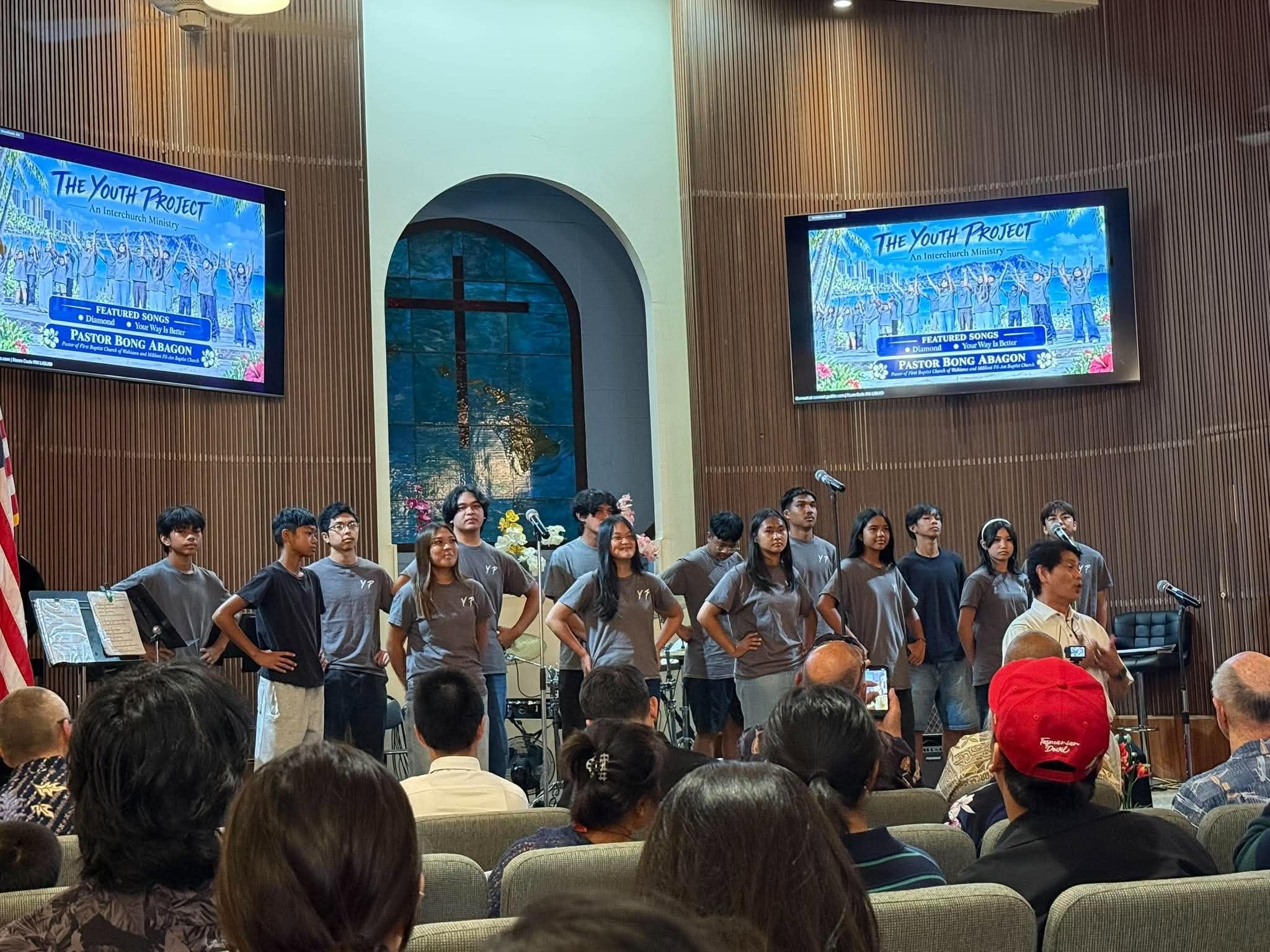 Youth Project group performing on stage at The Youth Project interchurch ministry event